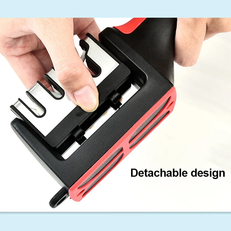 A hand is holding a black and red handheld knife sharpener with a detachable design.