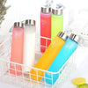 A collection of five 280ml leak-proof frosted water bottles in various colors including pink, white, green, and yellow, displ
