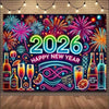 A vibrant neon sign featuring fireworks and a '2026 Happy New Year' design on a dark background.