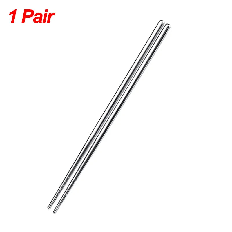 A pair of stainless steel chopsticks shown diagonally.