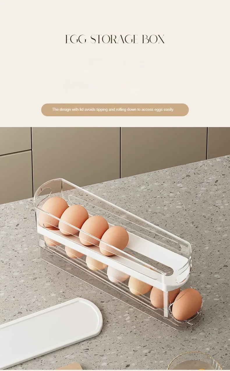 A clear plastic egg storage box with multiple compartments and an egg tray shown on a light surface.