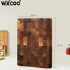A rectangular dark brown acacia wood cutting board with a checkered pattern, shown standing upright.