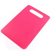 A bright pink plastic cutting board with a handle, shown from above.