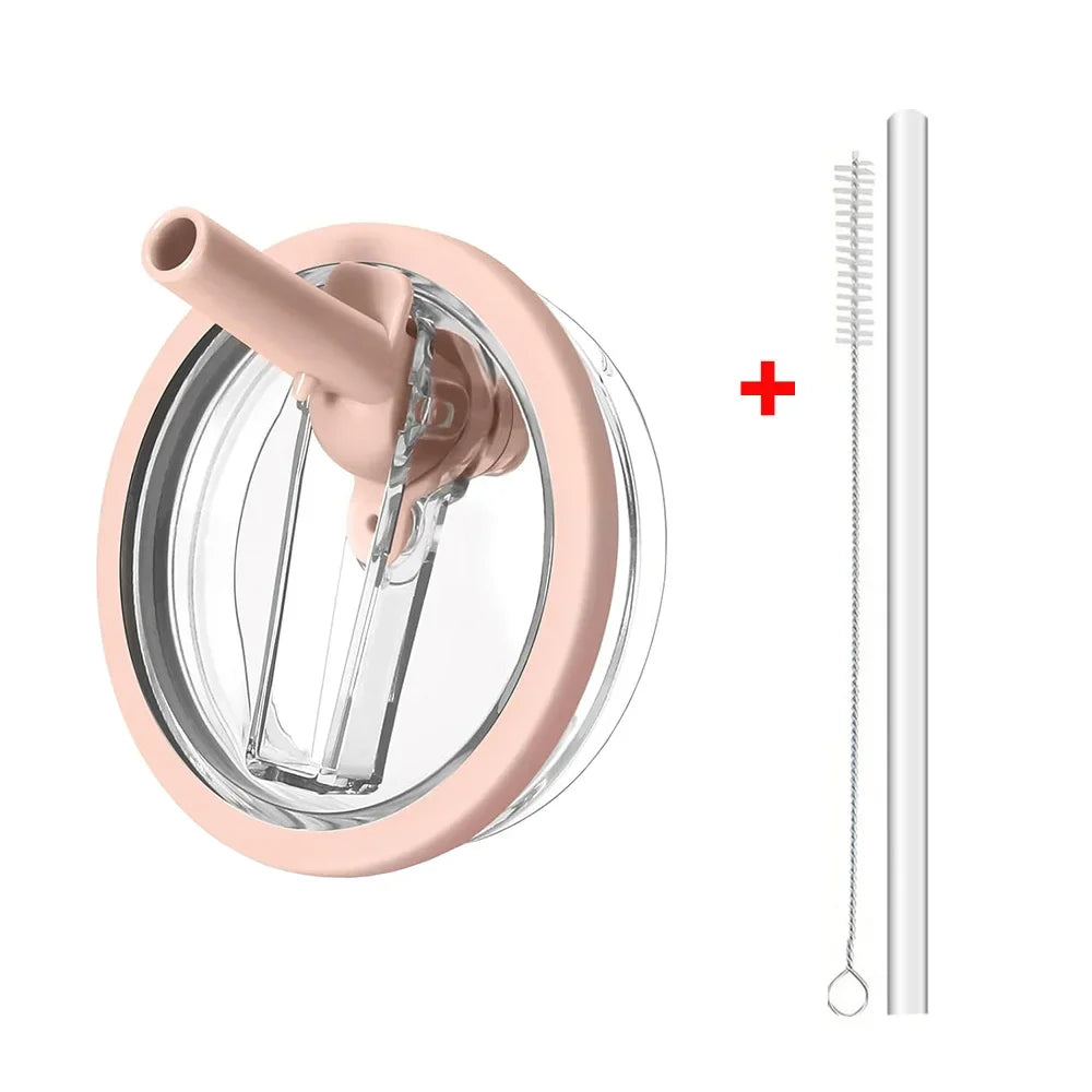 A pink leak-proof lid for a tumbler is shown next to its disassembled components.