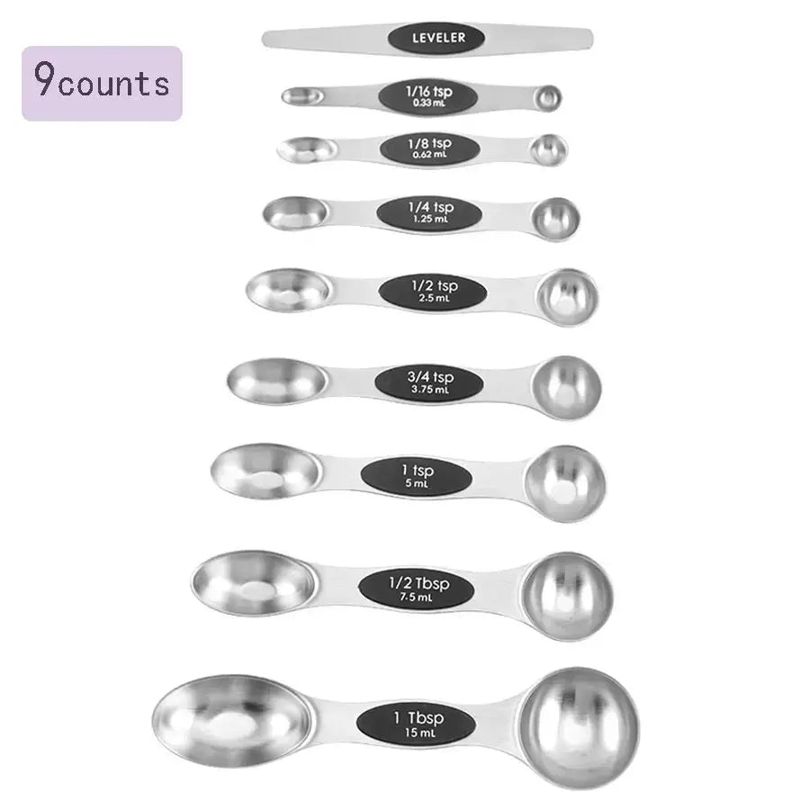 A set of nine magnetic stainless steel measuring spoons with various teaspoon sizes.