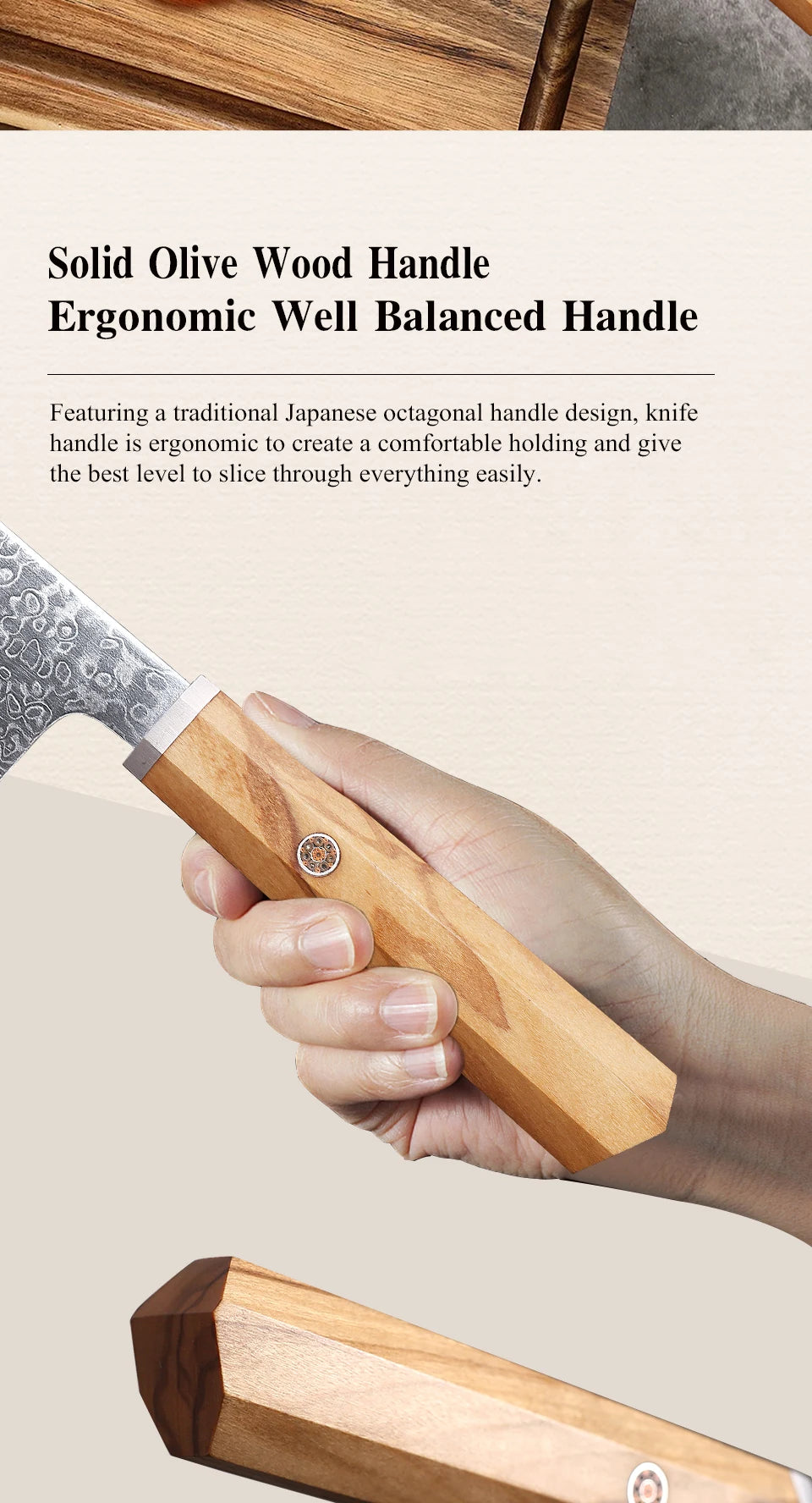 A hand holds a solid olive wood handle of an ergonomic Japanese style kitchen knife.