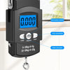 A black portable digital hanging scale displaying 0.000 kg with various function indicators.