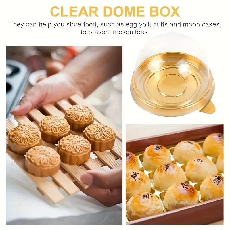 A clear dome box of golden yellow pastries and cakes is shown next to a glass of liquid.