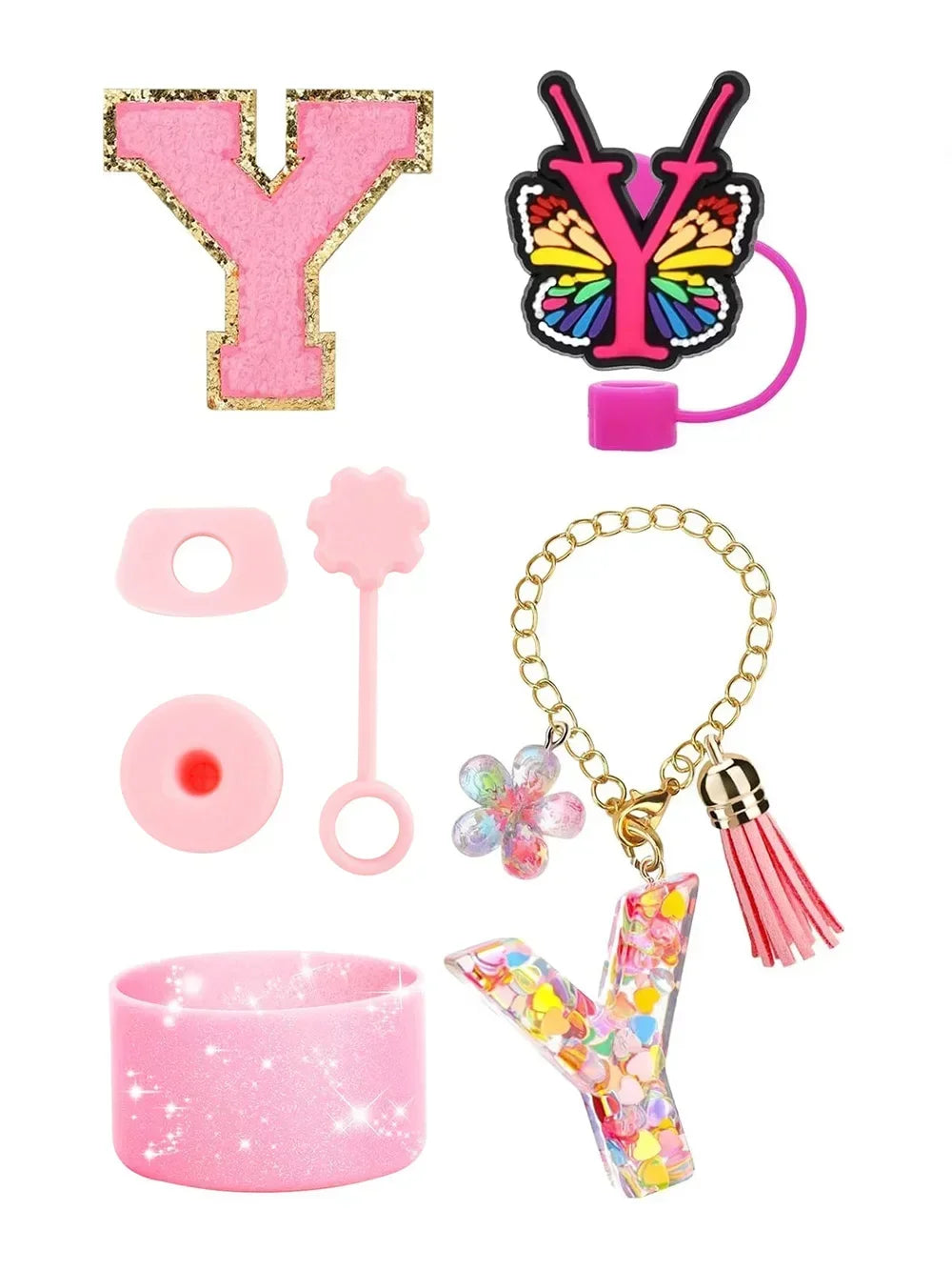 A set of silicone straw covers for tumblers includes a pink letter Y, a butterfly shaped straw topper, and a pink tumbler sle
