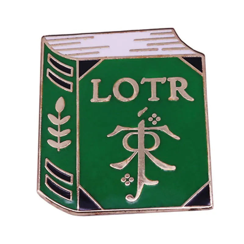 A green enamel pin shaped like a book with the letters LOTR and Chinese characters embossed on it.