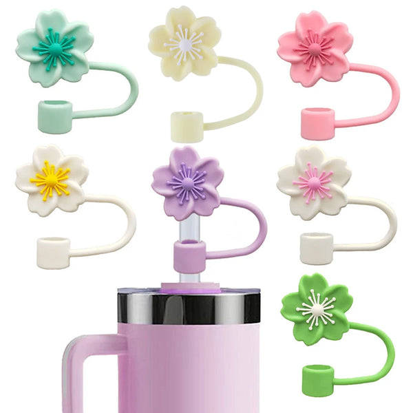 Ein Set aus rosa und grünem Blumenstroh-Deckel für Tumbler, mit verschiedenen Farben und Designs.