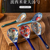 A set of five ceramic ladles in blue and white floral patterns displayed on a wooden surface.