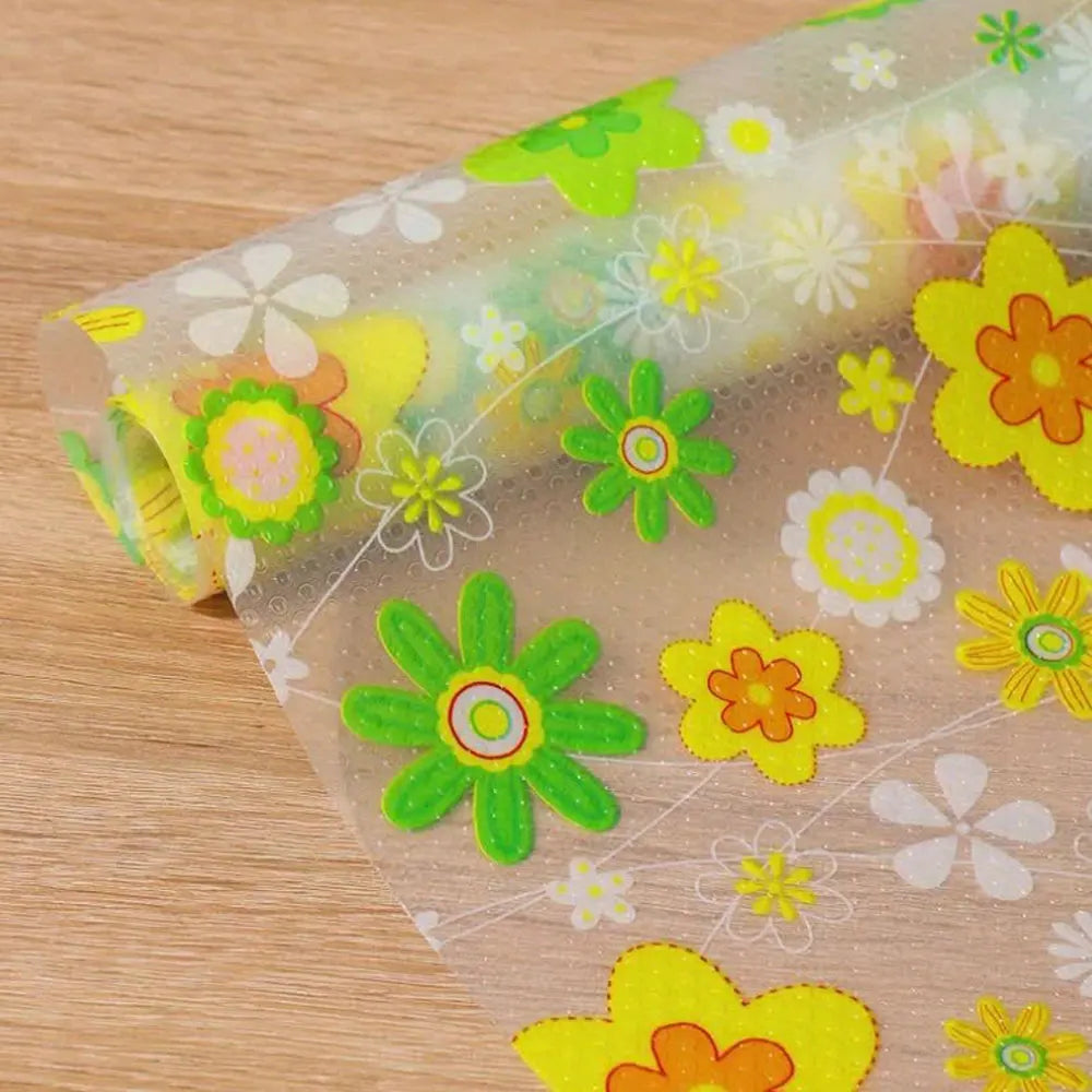 Almohadilla protectora de EVA transparente con estampado floral de flores amarillas, naranjas y verdes