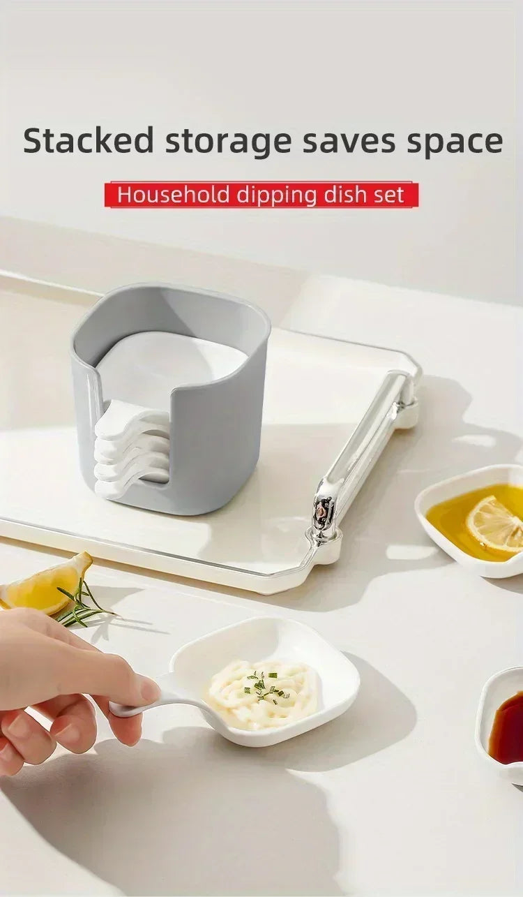 A hand is dipping a piece of food into a small white dish from a household dipping dish set.