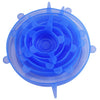 A clear silicone food lid set with multiple circular indentations and a small protrusion.
