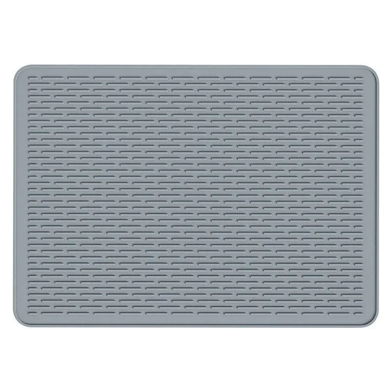 A gray silicone induction cooker protector mat with a grid pattern.
