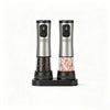 A silver automatic rechargeable salt and pepper grinder with visible peppercorns and coarse salt inside.