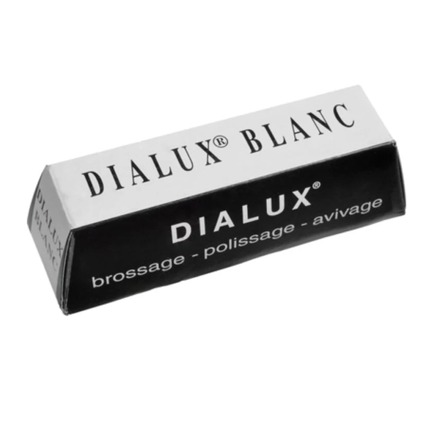 A black and silver box of Dialux Blanc jewelry polishing compound.
