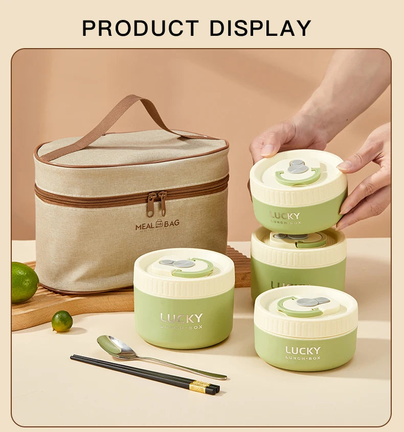 A display of portable stackable thermal lunch boxes in light green and beige, showing a bag and several containers.