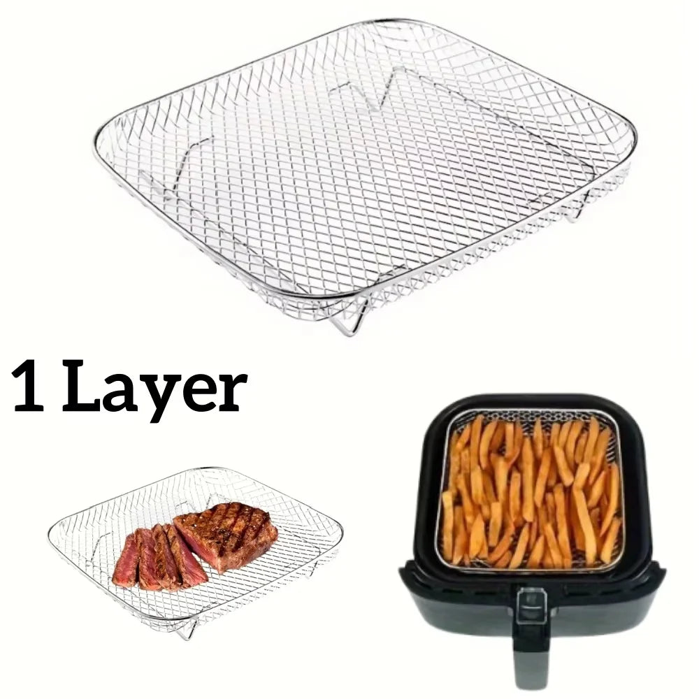 A single stainless steel grill rack is shown, with a smaller version placed inside a black frying pan.