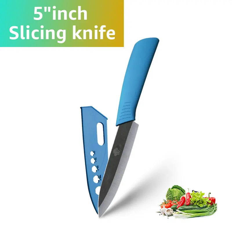 A blue ceramic slicing knife is shown next to a green vegetable and herbs.