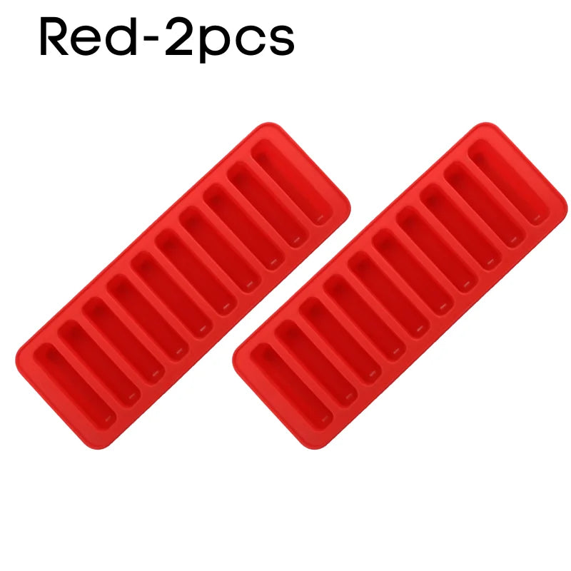 Two red silicone ice cube trays with an easy pop-out design.