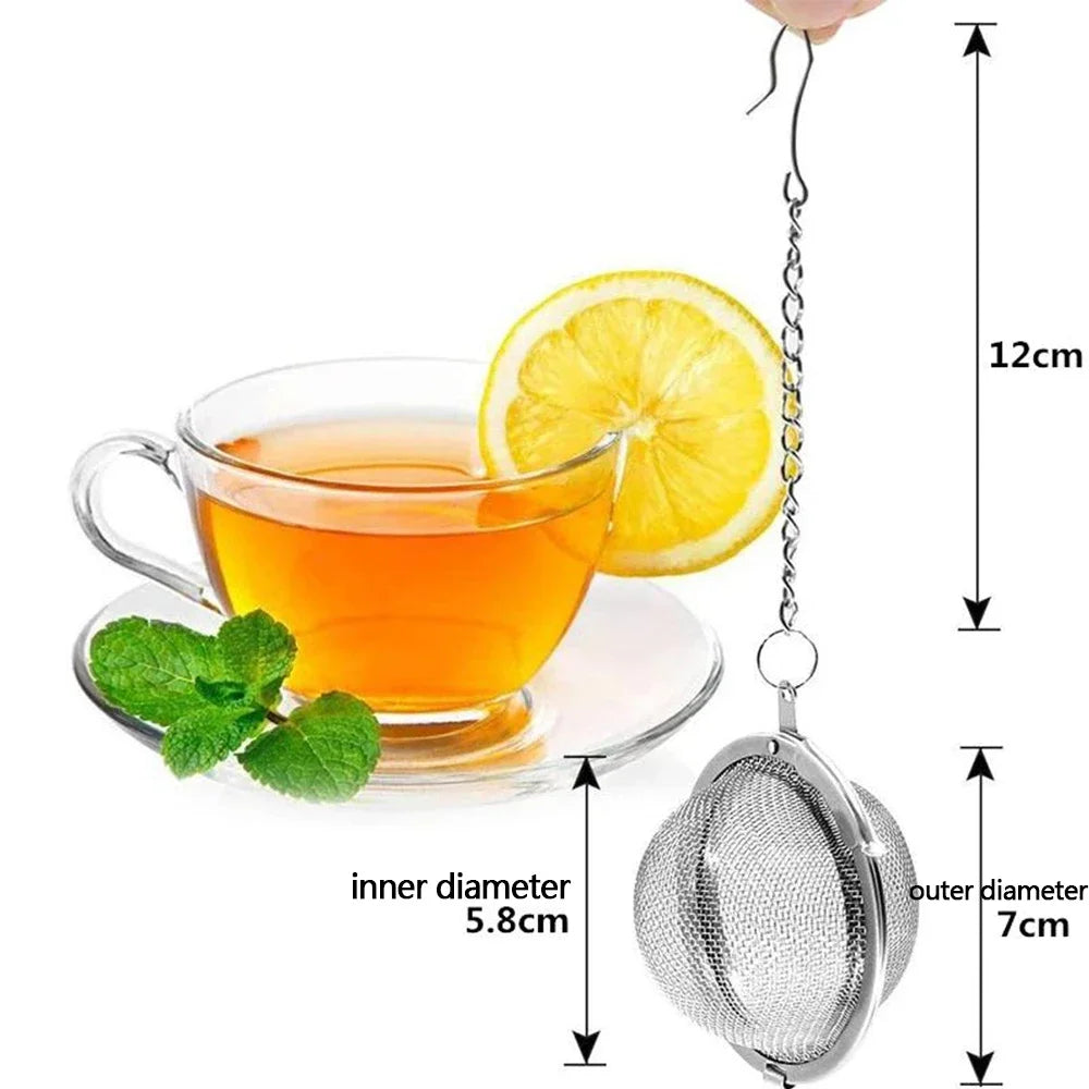 Stainless steel mesh tea infuser with a hook hanging from it