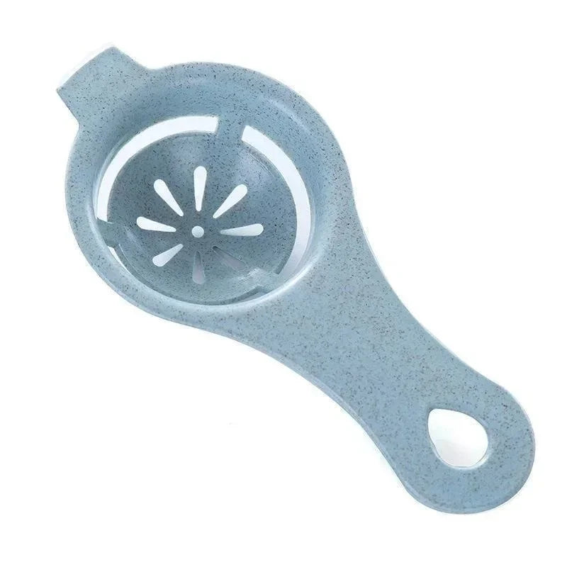 A light blue silicone multi-piece egg white and yolk separator set with a perforated bowl.