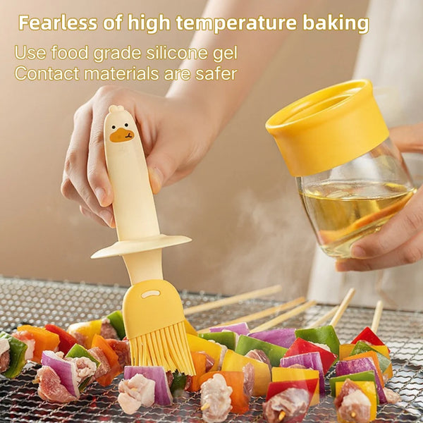 A hand uses a yellow silicone spatula to mix food in a glass bottle, demonstrating fearless of high temperature baking.