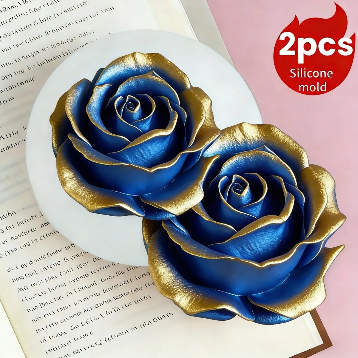 Two realistic blue and gold silicone flower molds are displayed on a white plate.