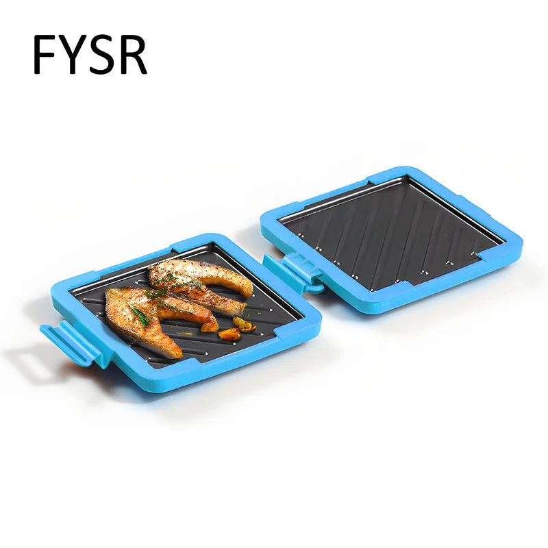 A blue silicone microwave sandwich maker with a black plate containing cooked fish fillets.