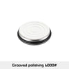 A round, silver and black object used for grooved polishing.