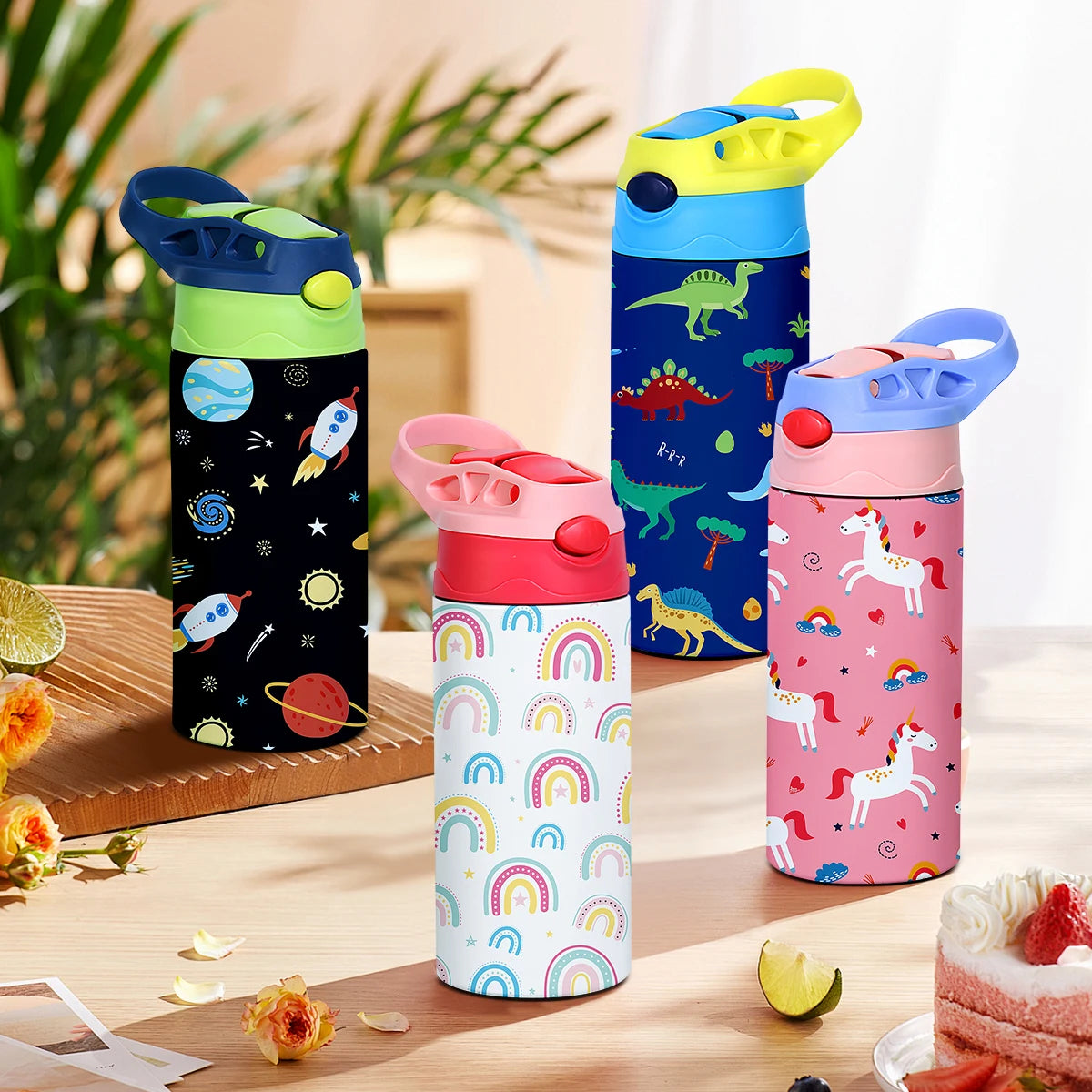 A collection of colorful insulated stainless steel water bottles featuring various cartoon designs and dinosaur themes.