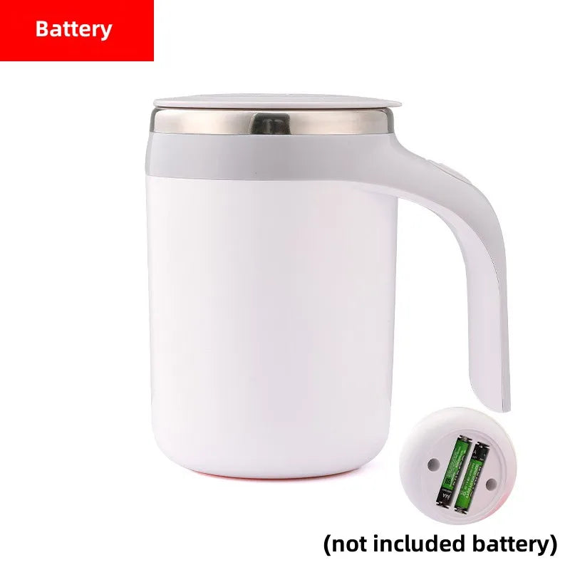 A white automatic self-stirring mug with a silver rim and a separate battery compartment shown next to it.