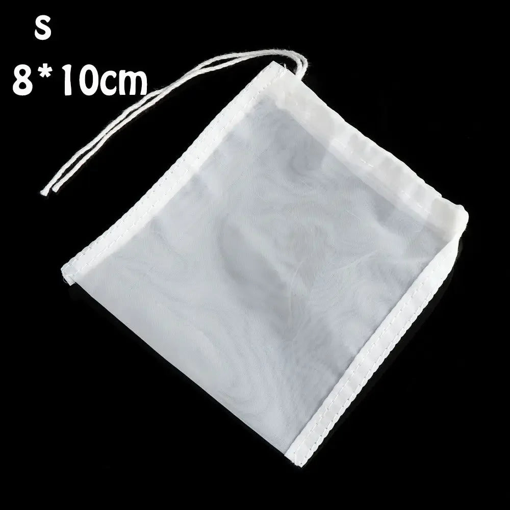 A white reusable fine mesh food strainer colander with a drawstring, measuring 8 by 10 cm.