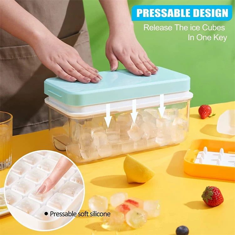 A hand presses a silicone ice cube tray to release ice cubes into a storage bin.