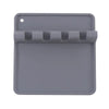 A gray silicone utensil drying rack organizer with a slotted tray and a hanging hole.