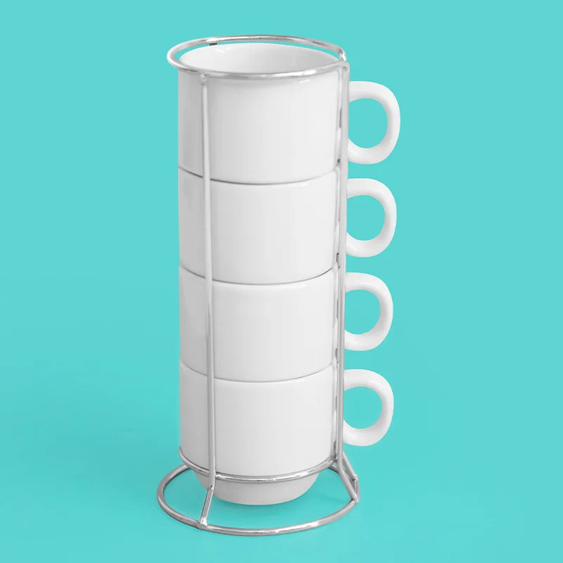 A set of four white ceramic cappuccino cups with a metal stand displayed against a light blue background.