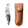 A silver double-hinged waiter's corkscrew with a wooden handle and a brown leather sheath.