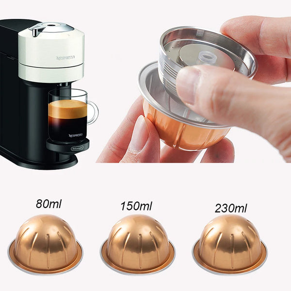 Reusable stainless steel coffee pods in various sizes 80ml, 150ml, and 230ml being held by a hand.