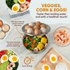 A stainless steel electric steamer is shown with eggs, corn, and shrimp being cooked.