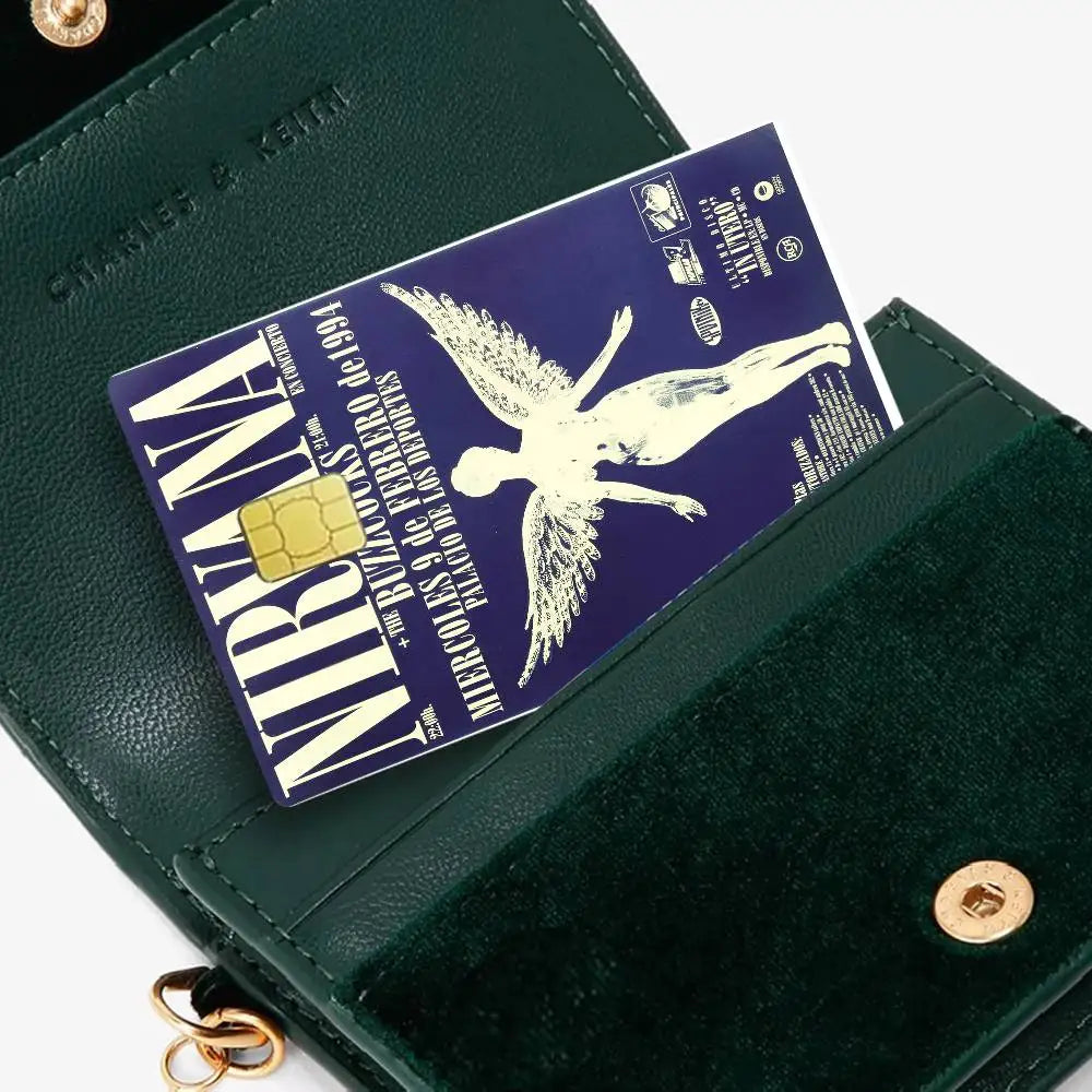 A dark green leather wallet with a purple debit card featuring an eagle design.