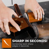 Hands are using a multi-angle rolling knife sharpener to sharpen a blade edge.