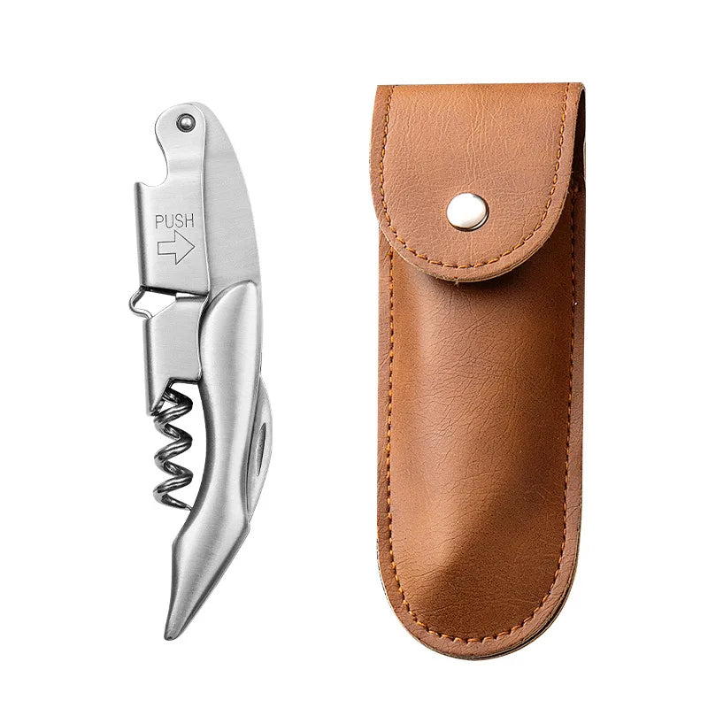 A silver double-hinged waiter's corkscrew with a leather sheath and foil cutter.