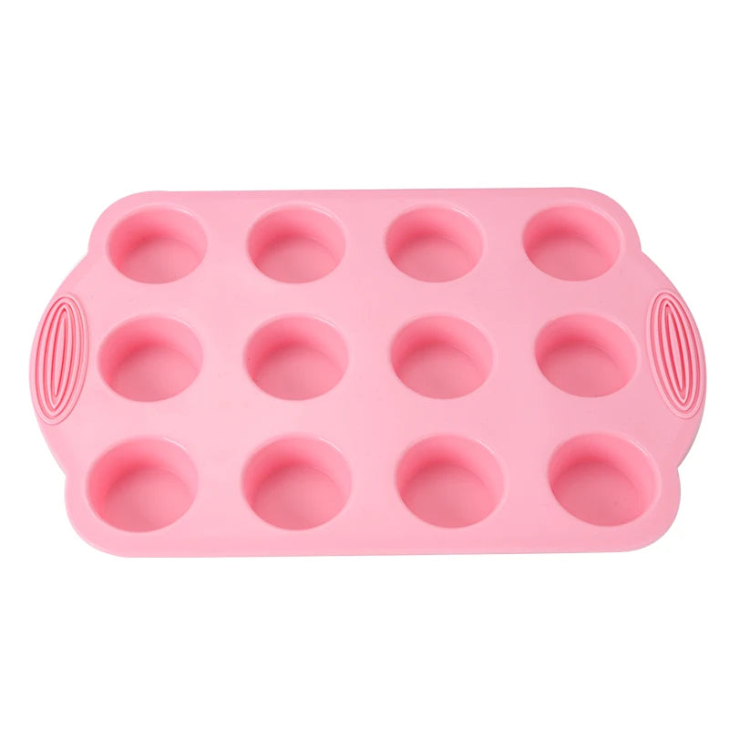 A pink silicone baking set with multiple round molds for cakes and desserts.