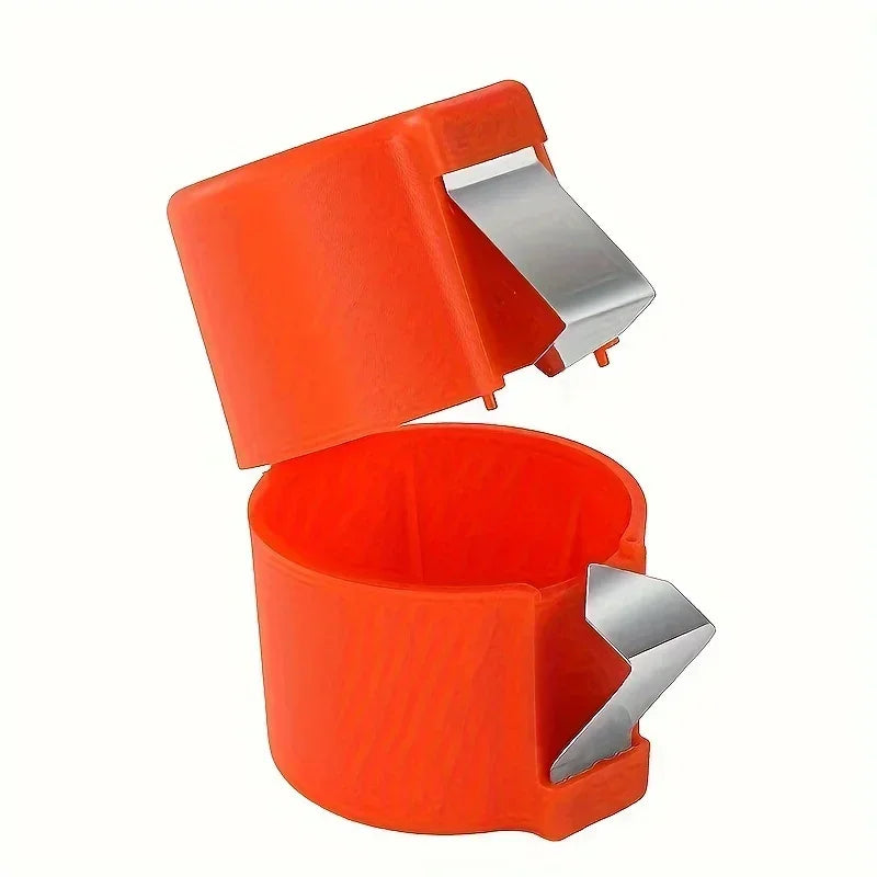 An orange portable egg shell opener and separator tool with silver tips.