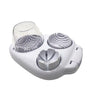 A white multi-function egg slicer and fruit cutter with a clear glass section and various cutting discs.