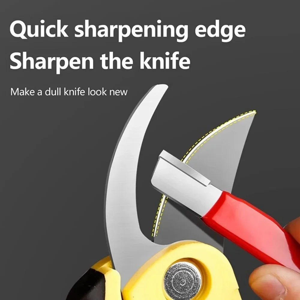 A hand is using a precision handheld metal knife sharpener to sharpen a knife blade.