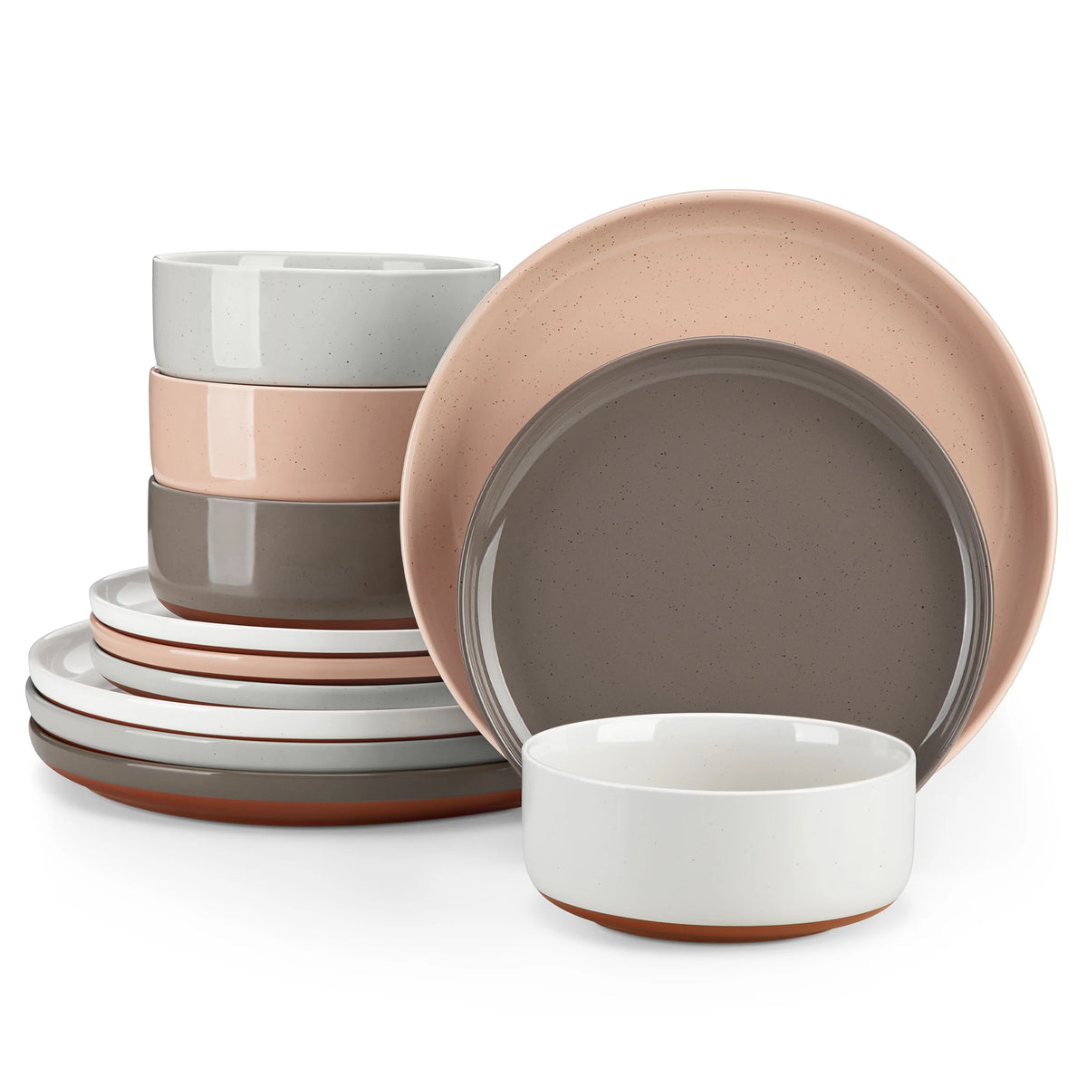 A stack of five ceramic plates and bowls in varying shades of beige and brown stoneware.