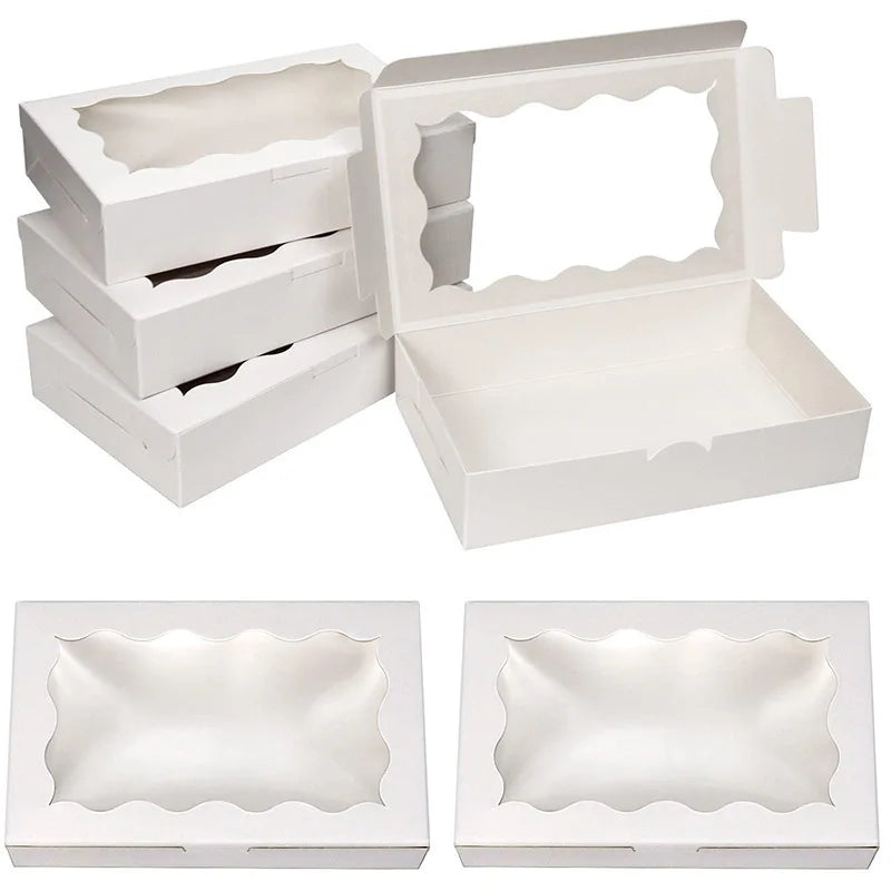 A set of white decorative kraft paper candy boxes for gifts, shown stacked and individually displayed.